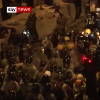 Police and protesters clash in Hong Kong