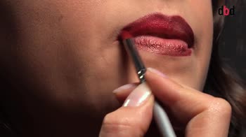 Make up per le feste. Labbra rosso porpora