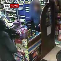 Brave storekeeper wrestles gun off robber