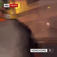 Protesters battle through tear gas in Hong Kong