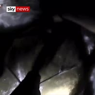 Dramatic river rescue caught on police camera