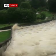 Toddbrook Reservoir overflows after heavy rain