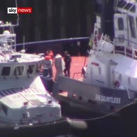 Migrant steps onto UK boat after Channel rescue