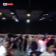 Moment Israeli PM rushed off stage