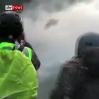 Police spray blue dye at Hong Kong protesters