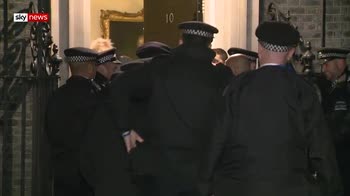 Johnson gets police escort to Number 10