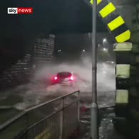 Car gets stuck in floodwater