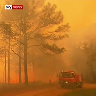Australia's bushfires: Thousands flee homes