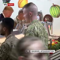 Trump serves troops a meal in Afghanistan