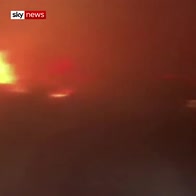 Firefighters battle Australia's 'mega fire'